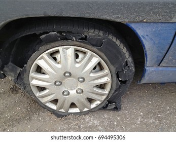 Tyre damage after puncture Ireland 2017 - Shutterstock ID 694495306