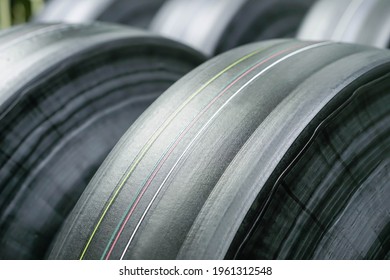 Tyre Manufacturing Production In Factory Warehouse, Green Tire Radial, Extruded Rubber Layers Preparing To Mold For The Curing Process, Car Logistic Transportation Industry