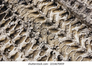 Tyre Mark Background. Tire Track Shape. Trail Lines On Dry Brown Sand Pattern. Road Construction Site Backdrop. Heavy Machinery Imprint. Dried Mud Vehicle Wheel Shape.