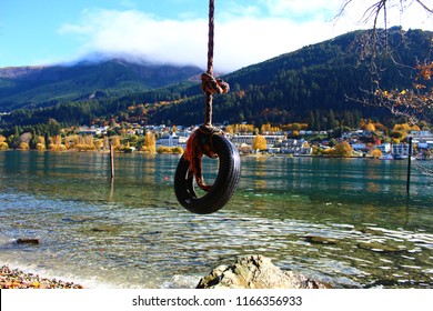 Tyre Swing By A Lake