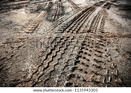 Image result for photo car tyre tracks gravel road pic