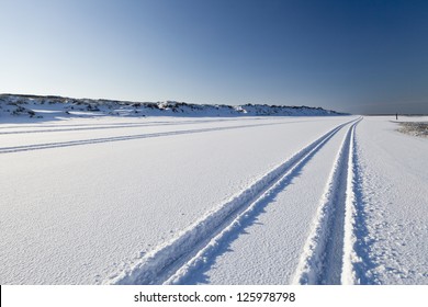 Tyre Tracks In The Snow