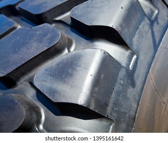 Tyre Tread, Background Texture Closeup Of Big Thick Chunky Rubber Tyre.