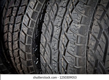 Tyre Treads, Background Texture Closeup Of Thick Chunky Rubber Tyres.