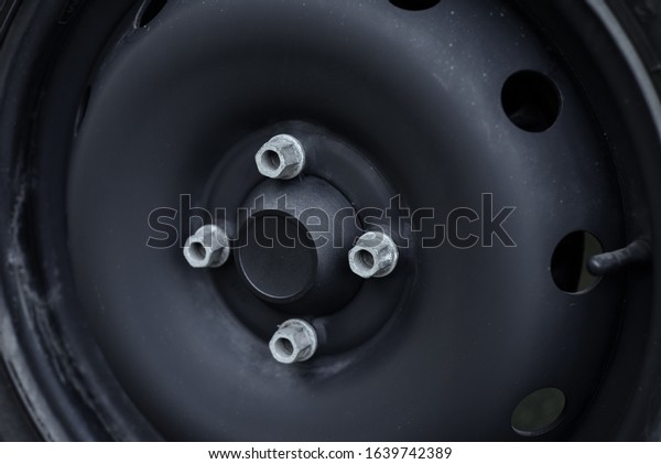 Tyres background. Car tyres close up. Close\
up view of car wheel. Transportation concept. Black color. Traffic\
jam. tire replacement.