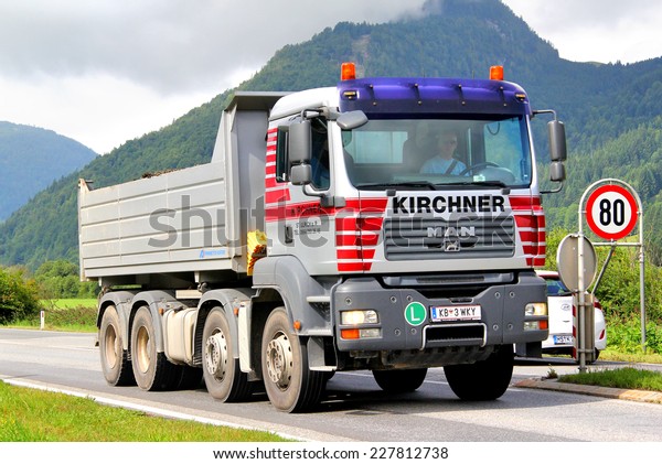 TYROL, AUSTRIA - JULY 29,\
2014: German dump truck MAN TGA at the Grossglockner High Alpine\
Road.