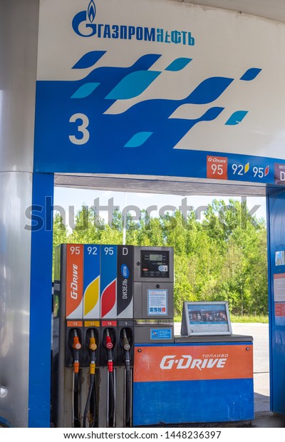 Tyumen\
region / Russia-06/29/2019: gas station on a background of blue sky\
with the inscription (translation-Gazprom\
Neft)