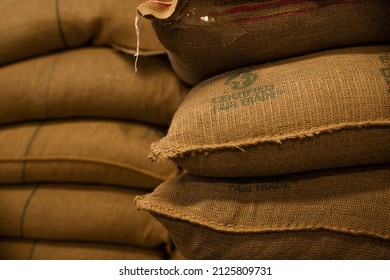 TYUMEN, RUSSIA - FEBRUARY 18, 2022: Bags Of Green Coffee Beans With 