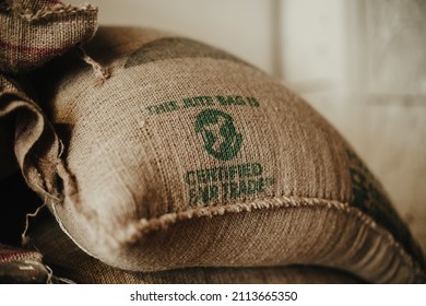 TYUMEN, RUSSIA - JANUARY 26, 2022: Bags Of Green Coffee Beans With 