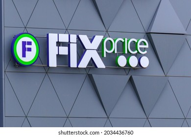 Tyumen, Russia-August 09, 2021: Fix Price logo on facade of building. Discount low price variety stores.