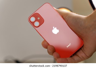 Tyumen, Russia-August 12, 2022: IPhone 12 Mini Product Red. Smartphone With Multi Touch Screen Produced By Apple Computer, Inc.