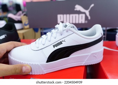 Tyumen, Russia-August 12, 2022: White Sneakers By Puma In A Sports Wear Store Showroom. Sport And Casual Footwear Concept