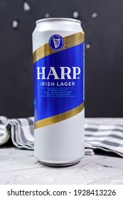 Tyumen, Russia-February 26, 2021: Beer Harp Irish Lager, Metal Can, Logo Close-up