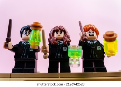 Tyumen, Russia-January 12, 2022: Harry Potter, Ron Weasley And Hermione Granger, Minifigures. Selective Focus