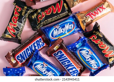 Tyumen, Russia-January 23, 2022: Snickers, Mars, Milky Way And Twix, Bounty Minis Candy Bars. Flat Lay