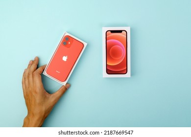 Tyumen, Russia-July 18, 2022: IPhone 12 Mini Product Red. Smartphone With Multi Touch Screen Produced By Apple Computer, Inc.