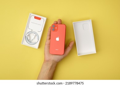 Tyumen, Russia-July 18, 2022: IPhone 12 Mini Product Red. Smartphone With Multi Touch Screen Produced By Apple Computer, Inc.