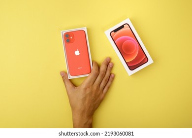 Tyumen, Russia-July 18, 2022: IPhone 12 Mini Product Red. Smartphone With Multi Touch Screen Produced By Apple Computer, Inc.