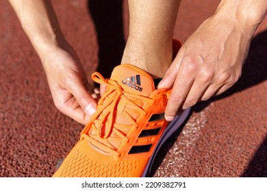 Tyumen, Russia-June 15, 2022: Adidas Running Shoes Orange Color. Adidas, Multinational Company. Product Shots. Selective Focus