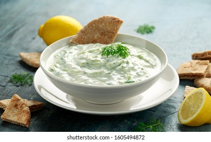 Tzatziki Dip Sauce With Greek Yogurt, Garlic, Dill And Cucumber In White Bowl