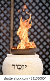 TZUR SHALOM CEMETERY, ISRAEL -  MAY 1, 2017. Memorial flame burning at memorial ceremony on Memorial Day for the Fallen Soldiers of Israel and Victims of Terrorism.