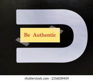 U Letter On Black Wall With Note Written BE AUTHENTIC, Concept Of Being True Authentic Self, Express Whole Self Genuinely, Start With Self-awareness And Self-acceptance