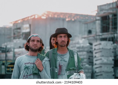 UAE Dubai - Feb 18, 2022: Confident Construction Worker Or Labour Looking Camera At Workplace - Concept Of Daily Wagers Lifestyle And Happi