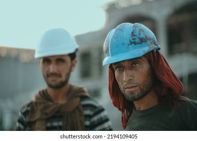 UAE Dubai - Feb 18, 2022: Confident Construction Worker Or Labour Looking Camera At Workplace - Concept Of Daily Wagers Lifestyle And Happi