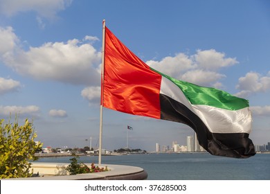 UAE Flag Waving With The Background Of Abu Dhabi Skyline As Part Of 43rd National Day Celebrations