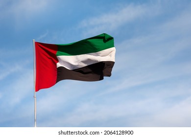 uae flag waving in the sky national symbol