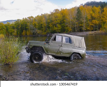 UAZ car stuck in the river