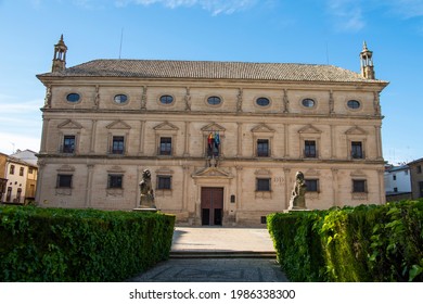 Ubeda - Jaen - Spain On 1st Of May Of 2021: Main Facade Of The Renaissance Town Hall Of The City Of Ubeda In Jaén, Surrounded By Hedges And Two Rampant Lions With Two Shields.