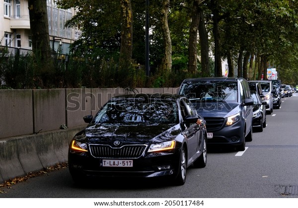 Uber drivers drive their taxis in a motorcade\
through the city centre during a protest against the local\
government’s ban on using smartphones when driving in Brussels,\
Belgium on September 30,\
2021.
