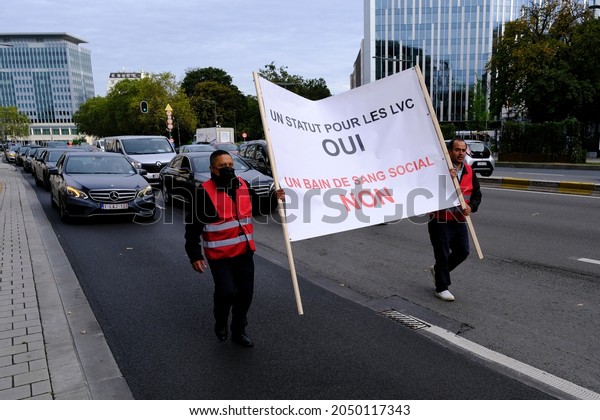 Uber drivers take part in  a protest against\
the local government’s ban on using smartphones when driving in\
Brussels, Belgium on September 30,\
2021.