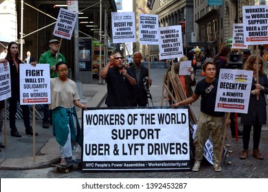 Uber and Lyft Drivers With Signs on Strike and Protesting Outside the New York Stock Exchange at 26 Wall Street In New York, NY, USA on May 8th, 2019