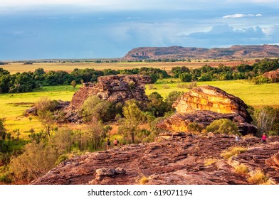 Ubirr Rock, Australia -May 29, 2016: People Exploring Ubirr Rock At Golden Hour -
 Kakadu National Park, Northern Territory, Australia. A Superb Place To Get A View Across The Floodplains.