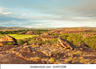 Ubirr Rock, Australia -May 29, 2016: People Entering The Aboriginal Sacred Site At Ubirr Rock Kakadu National Park, Northern Territory, Australia. We See Some Smoke From Controlled Burning In Sky. 