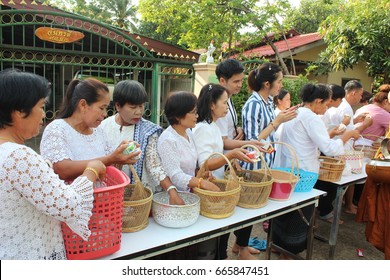 Ubon ratchathani, Thailand – June 25, 2017: Asian peoples organizes charity activities to inherit traditions in buddhism at Ubon Ratchathani, Thailand - Shutterstock ID 665847451