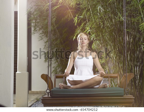 Ucasion Woman Doing Yoga On Swing Stock Photo Edit Now 654704212