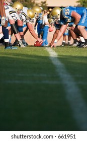 UCLA Bruin Football Team On The Line Of Scrimmage