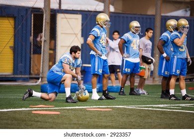 UCLA Bruins Football Players Waiting At The Sidelines During Practice