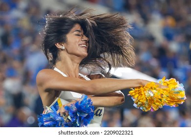 An UCLA Cheerleader Performs In A Timeout During An NCAA College Football Game Against The Washington Friday, Sept. 30, 2022, In Pasadena, Calif. 