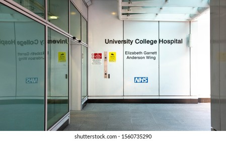 UCLH London College Hospital Unit. Glass Door Entrance To Maternity, Gynaecology And Neonatal Care Wards With A Black Sign On The Wall White University College Hospital Elizabeth Garett Anderson Wing.