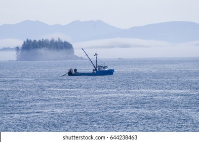UCLUELET, BRITISH COLUMBIA CANADA AUGUST 22,2013: Small fishing boat along Ucluelet coast, Vancouver Island, British Columbia Canada