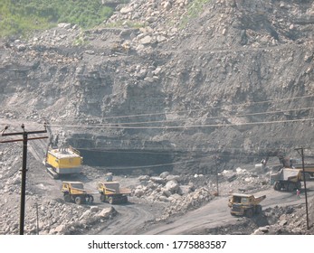 Udaipur, India - June 29, 2020 : A Mines In Dia With Operating Heavy Machinery Equipments And Dump Truck Earthmover.