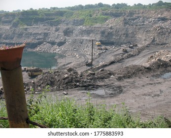 Udaipur, India - June 29, 2020 : A Mines In Dia With Operating Heavy Machinery Equipments And Dump Truck Earthmover.