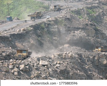 Udaipur, India - June 29, 2020 : A Mines In Dia With Operating Heavy Machinery Equipments And Dump Truck Earthmover.