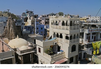 Udaipur, India - March 2020: Colorful streets, house facades and palaces of Udaipur. White city of Rajasthan,