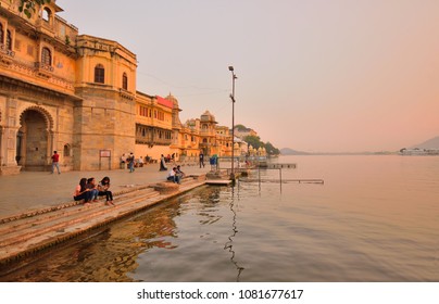 Udaipur, India - November 13, 2017: People Visiting Gangaur Ghat At Lake Pichola During Sunset.