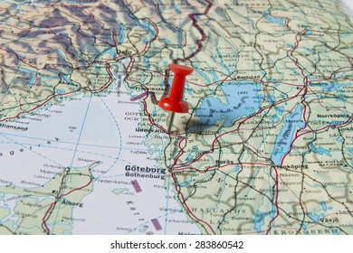 Uddevalla Marked With Red Pushpin On Map. Selected Focus On Uddevalla And Bright Red Pushpin. Pushpin Is In An Angle. Southern Parts Of Norway And Sweden Can Be Seen On Map With Oslo And Goteborg. 